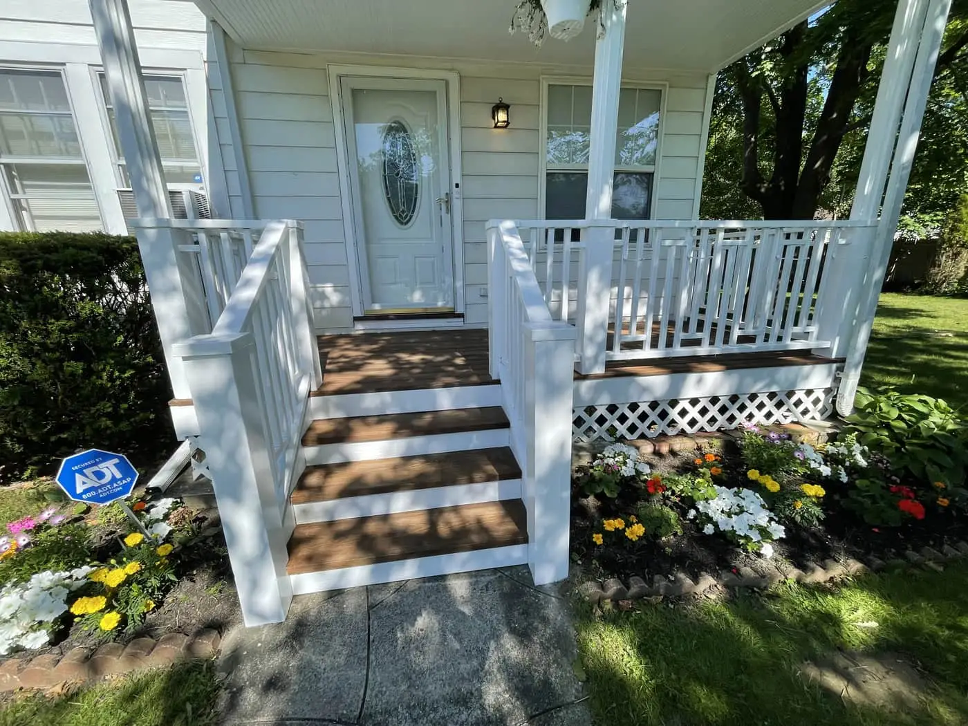 Front porch with freshly painted railings