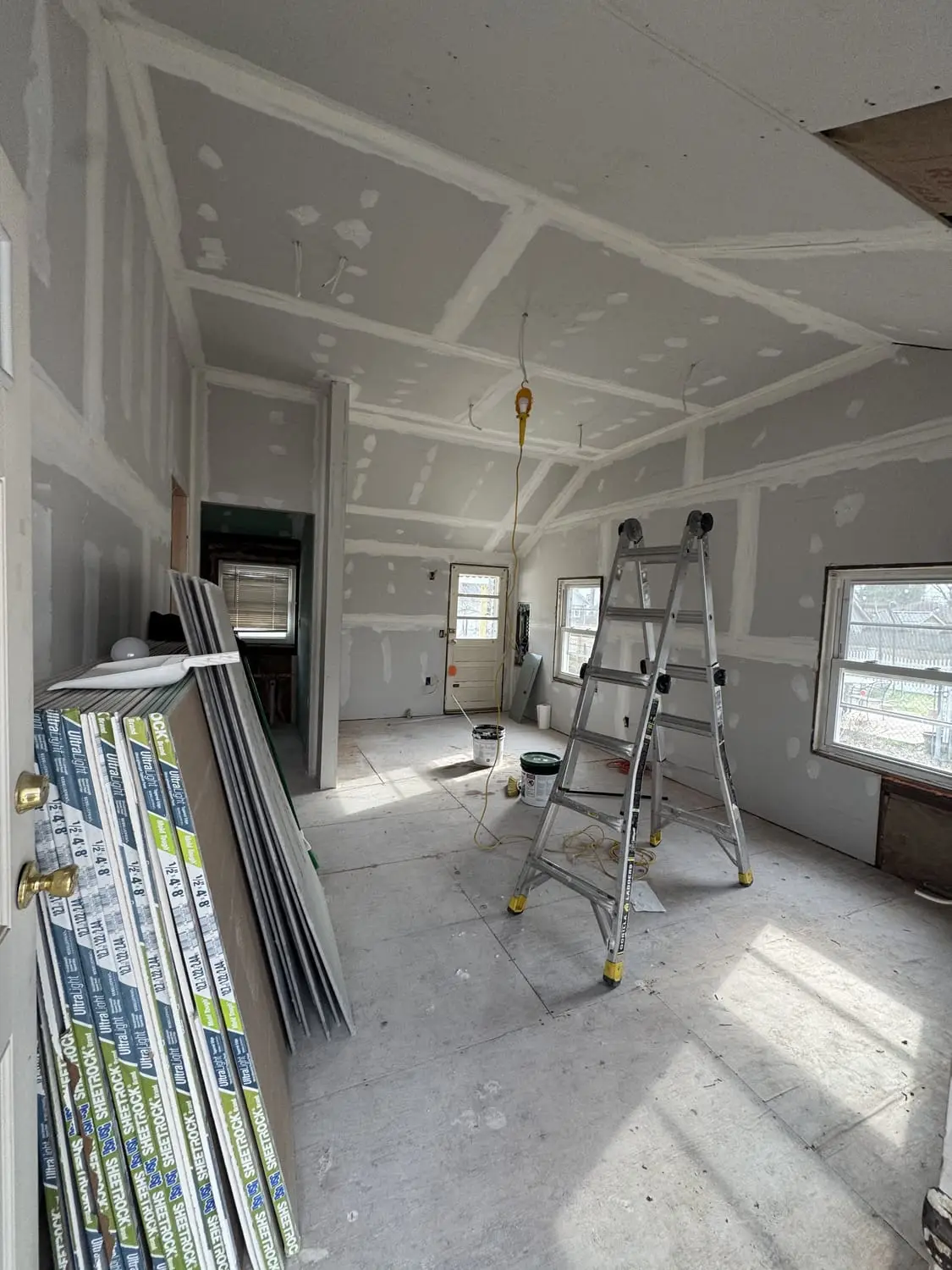 Interior walls spackled, sanded and primed, ready for a fresh coat of paint